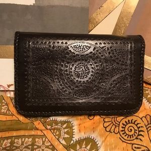 Vintage leather hand clutch